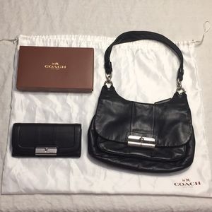 Coach shoulder bag with matching wallet.